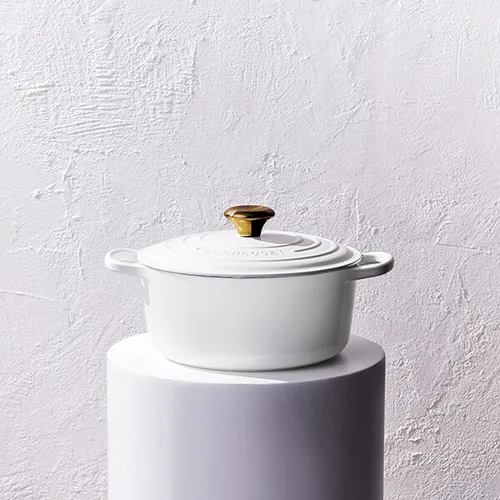 Le Creuset Cocotte rotonda Evolution in ghisa vetrificata 24CM Bianco con pomolo oro